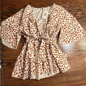 Women’s S short sleeve animal print tunic Never been worn